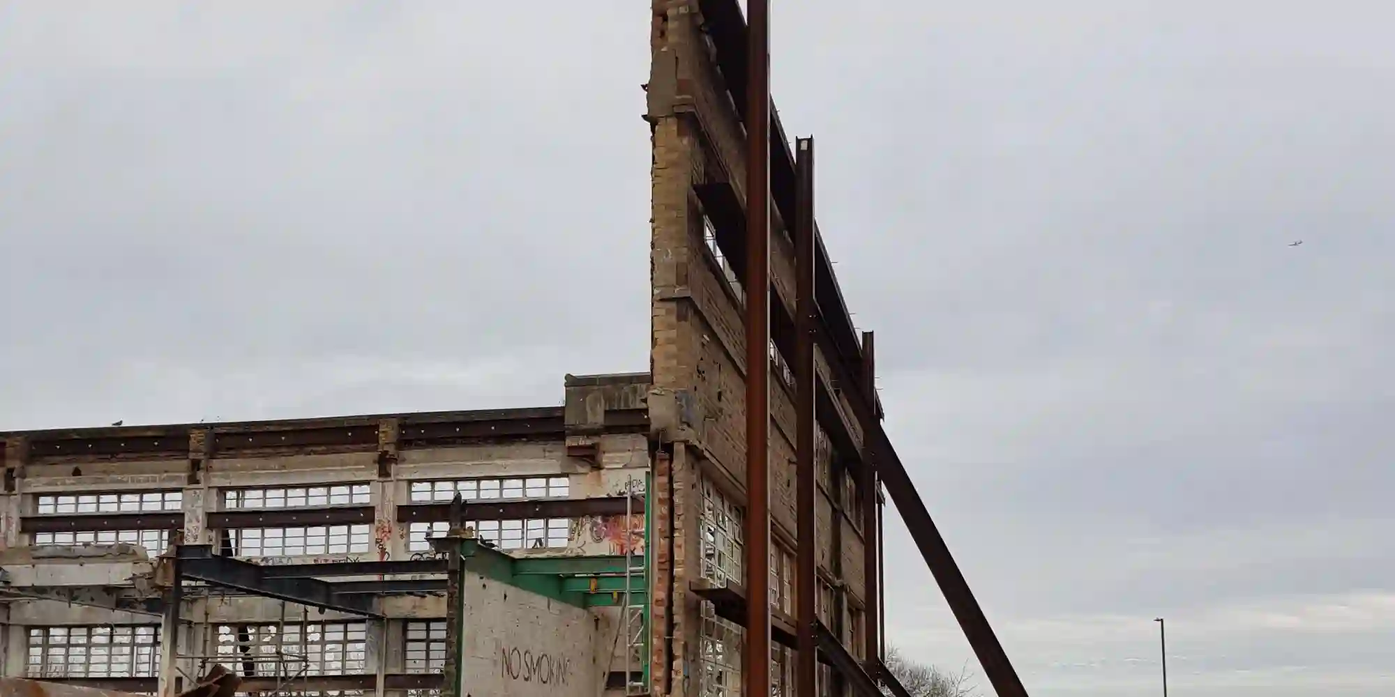 Image of temporary works supporting facade retention of Grade I listed building